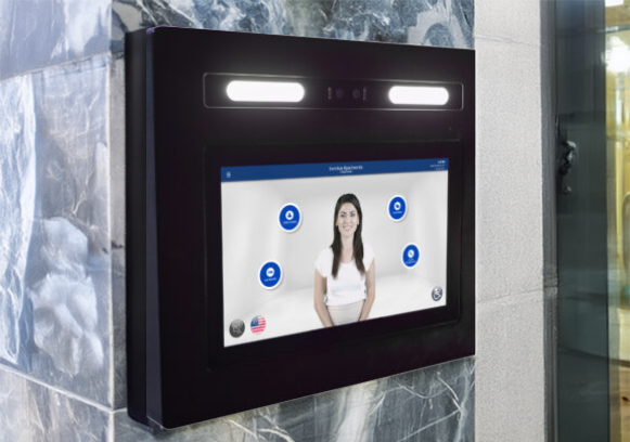 The Invictus intercom, Kiosk being mounted on a marble wall beside the entrance of an apartment