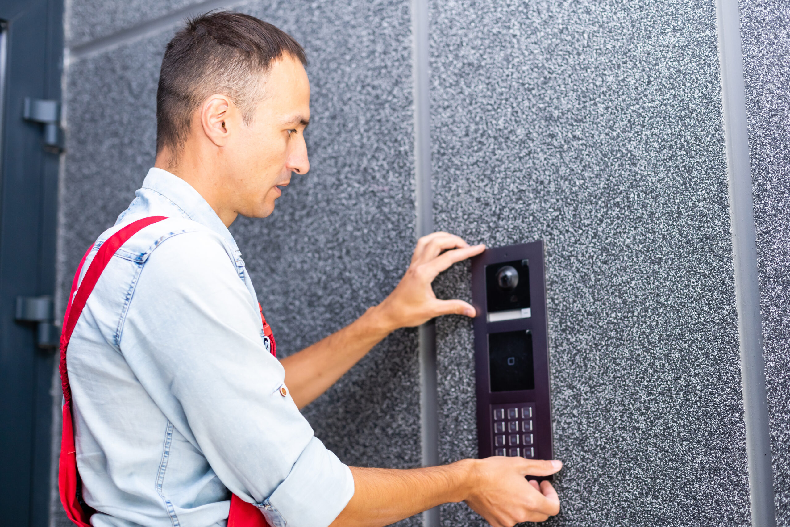 technician installing intercom system