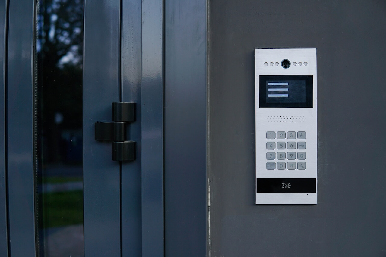 Video entrance doorbell in the entry of a modern house, technology and security concept