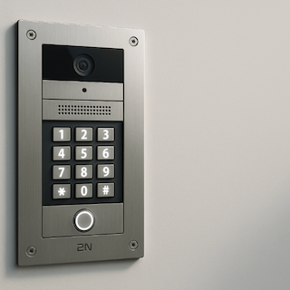 2N intercom mounted on a gray wall