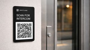 qr code plaque mounted beside door