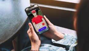 resident receiving mobile video call from delivery person