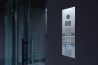 video intercom mounted on a black wall
