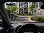 interior of a car showing STiD windshield sticker opening barrier gate via RFID technology
