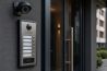 Modern intercom system with a camera and multiple apartment buttons