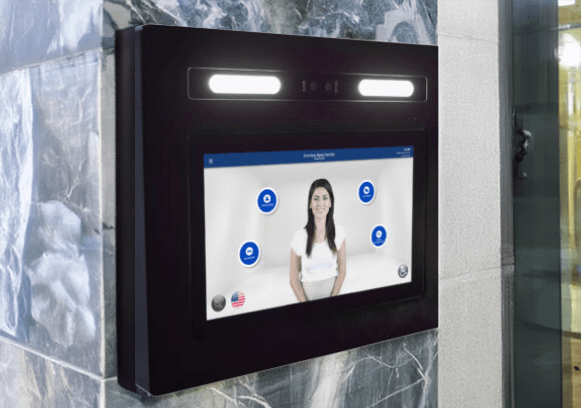 The Invictus intercom, Kiosk being mounted on a marble wall beside the entrance of an apartment