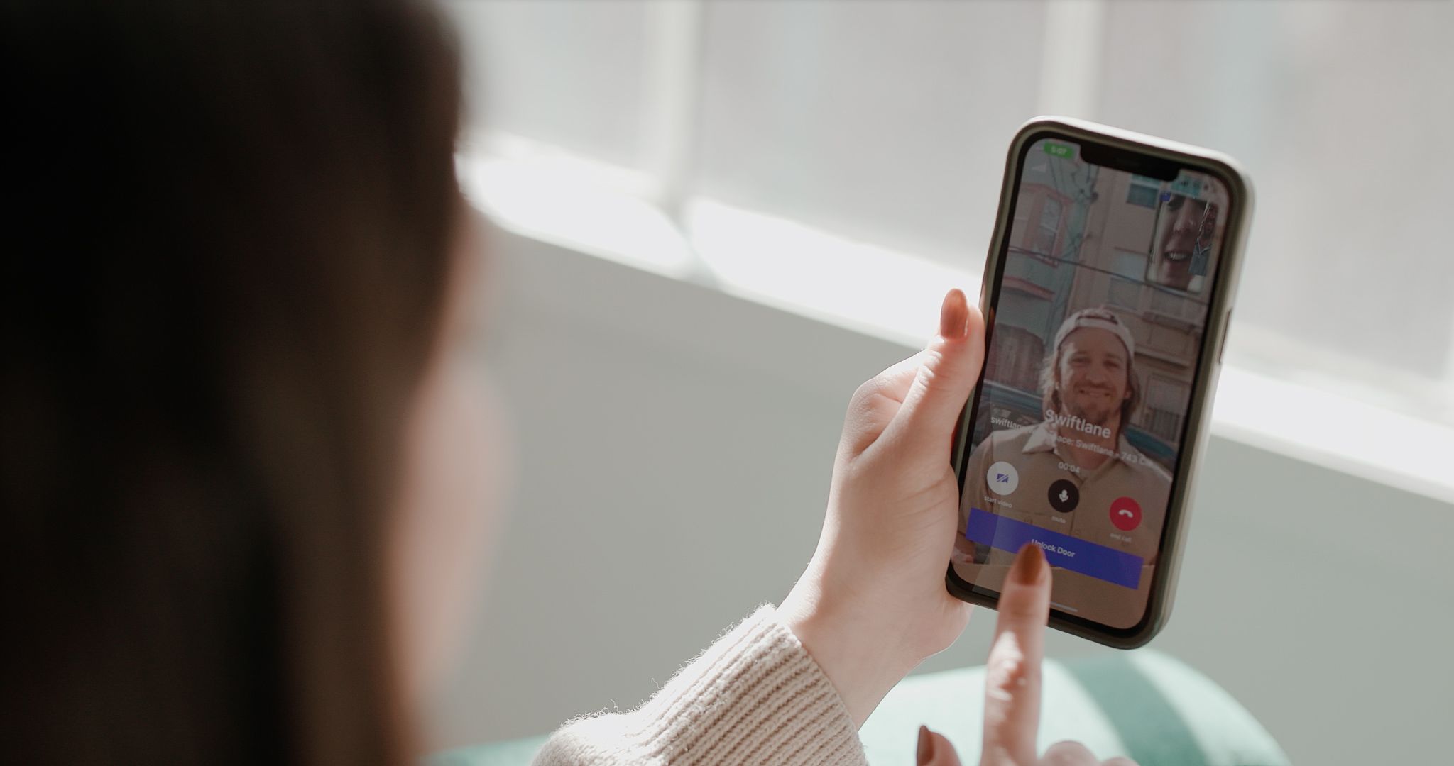 resident on a video call with visitor