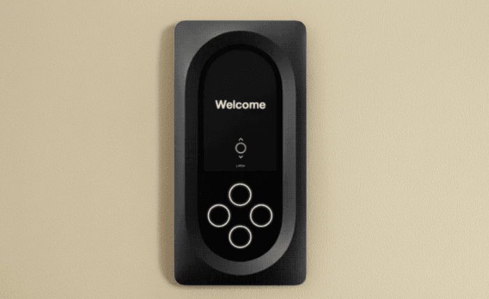 latch intercom mounted on a wall