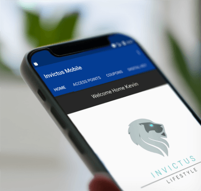 Image of a person's hand operating the Invictus Lifestyle mobile application