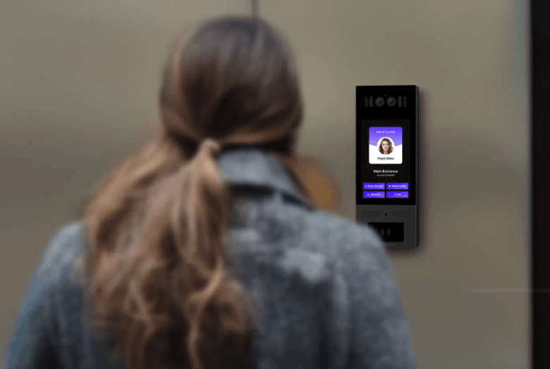 Woman using Swiftlane intercom system