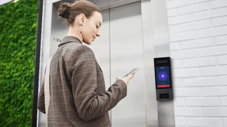 woman using an intercom system
