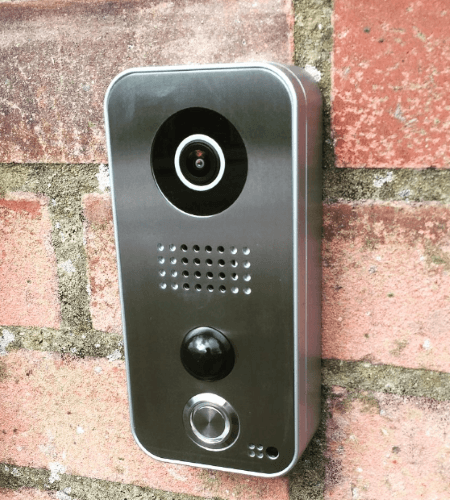 DoorBird intercom mounted on a wall